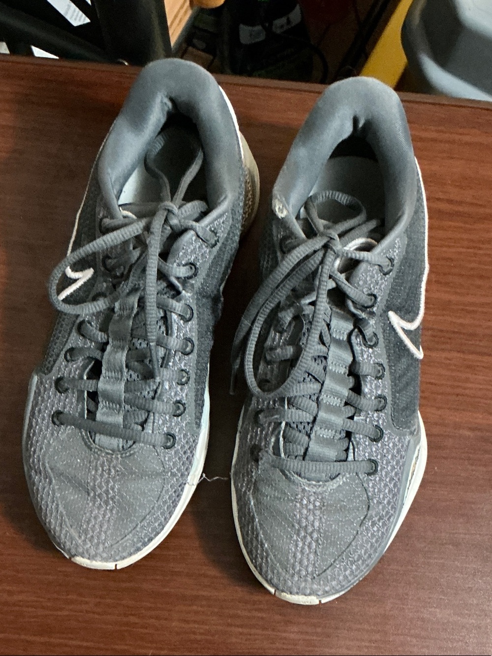 Nike Gray Lace-Up Running Shoes with White Swoosh